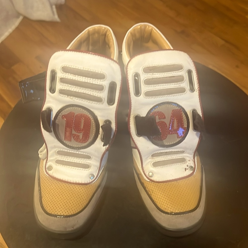 Used multi colored designers high fashion sneaker